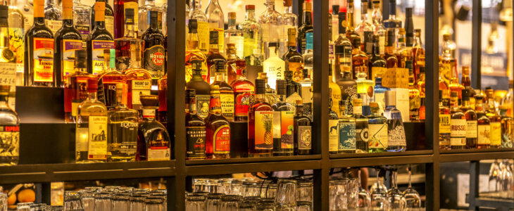 A bar with bottles of liquor